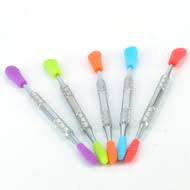 Metal dab tool with silicone cover